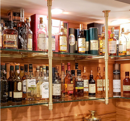 Ceiling & wall mounted Studio style Bistro Designer Shelving in polished brass with glass shelves