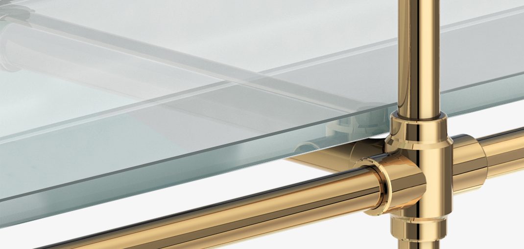 Close-up of Sudio style Bistro Designer Shelving in polished brass with glass shelves