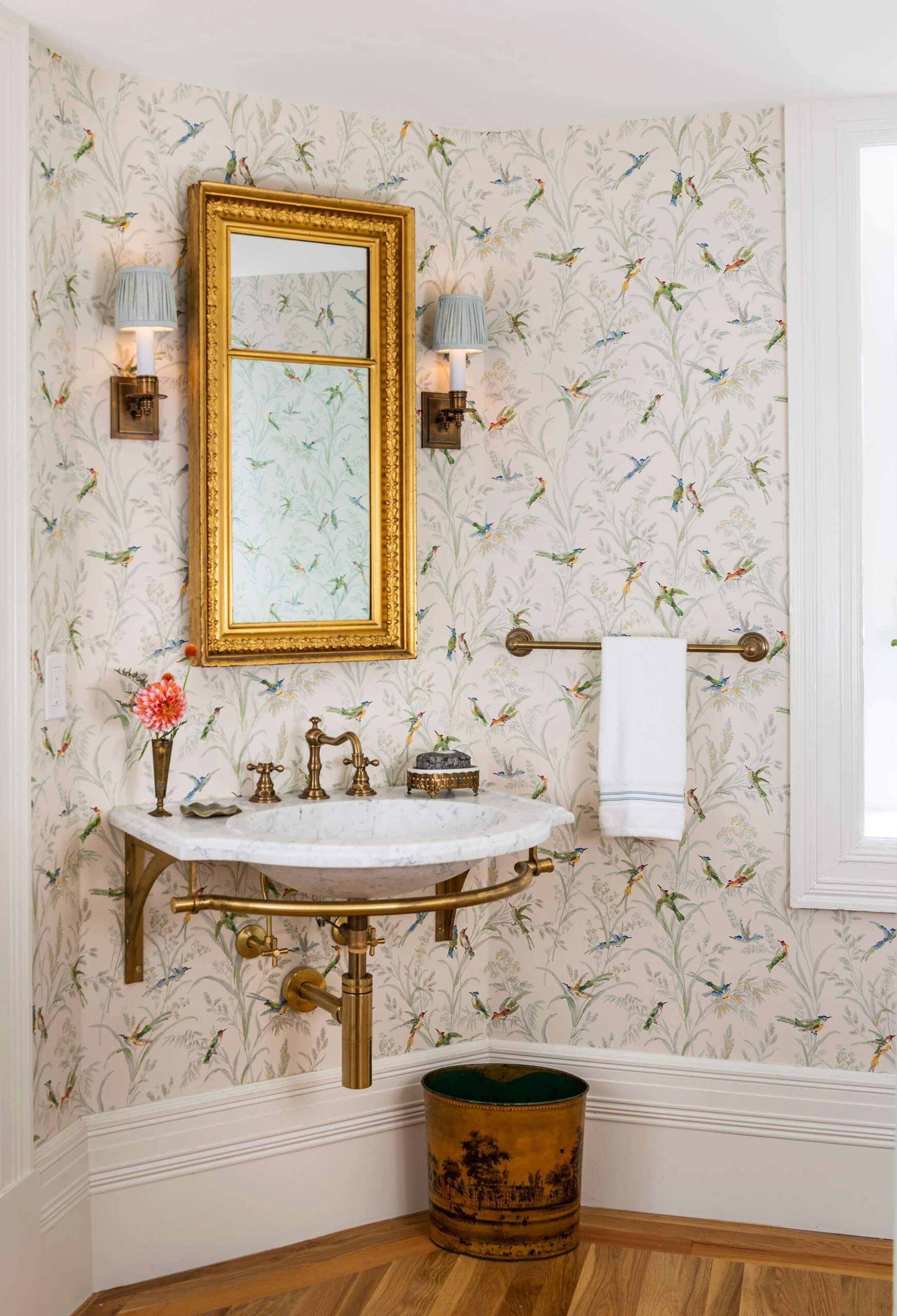 Regency style wall-mounted vanity in aged brass