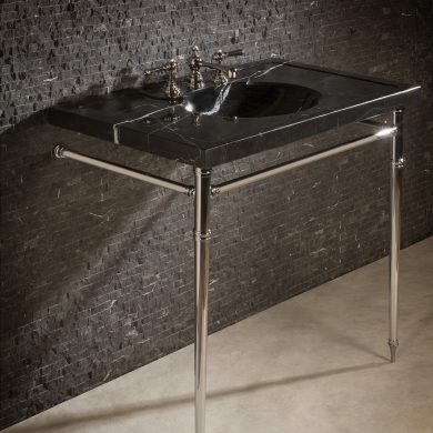 Corner detail of an Essex style Vanity Leg System in polished nickel
