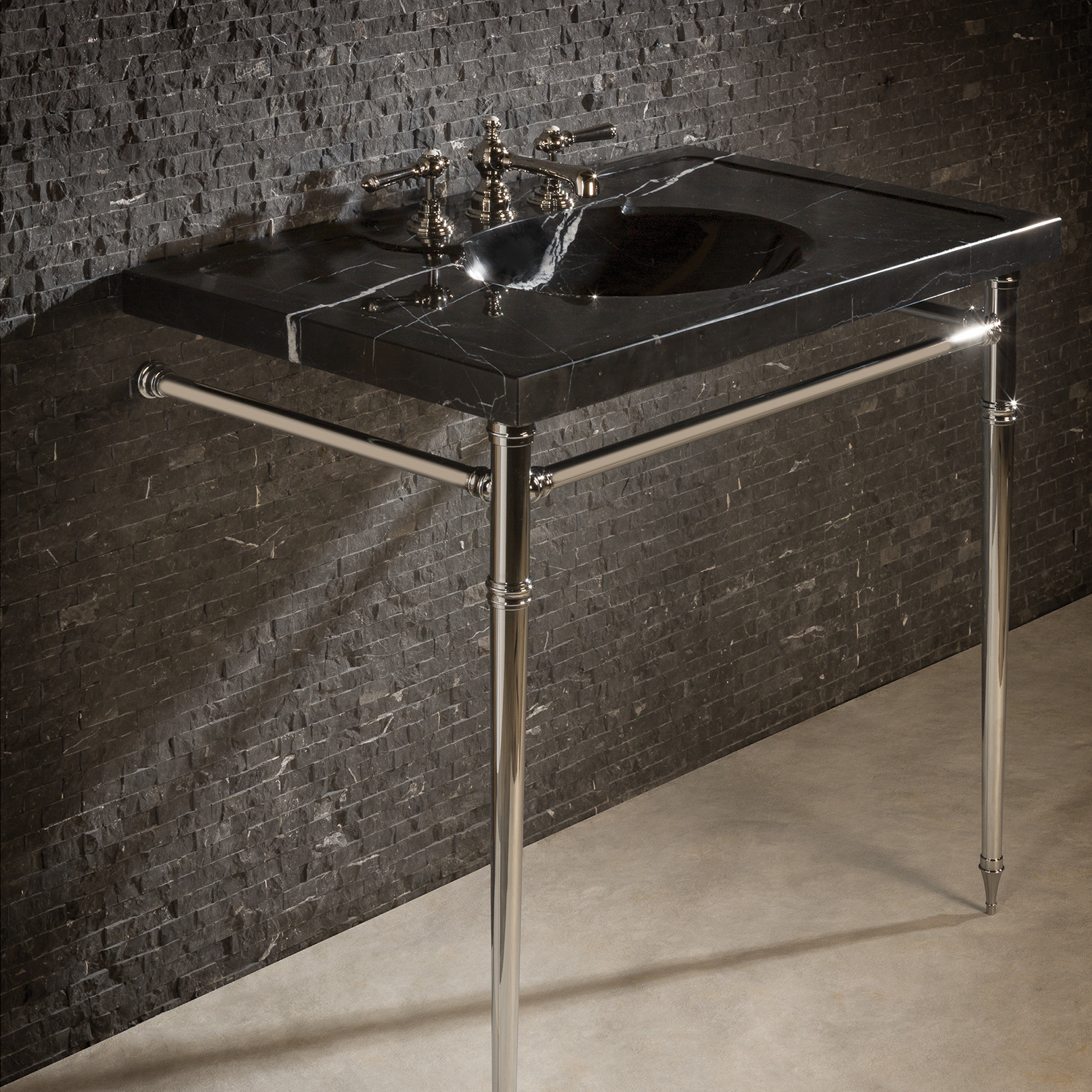 Corner detail of an Essex style Vanity Leg System in polished nickel
