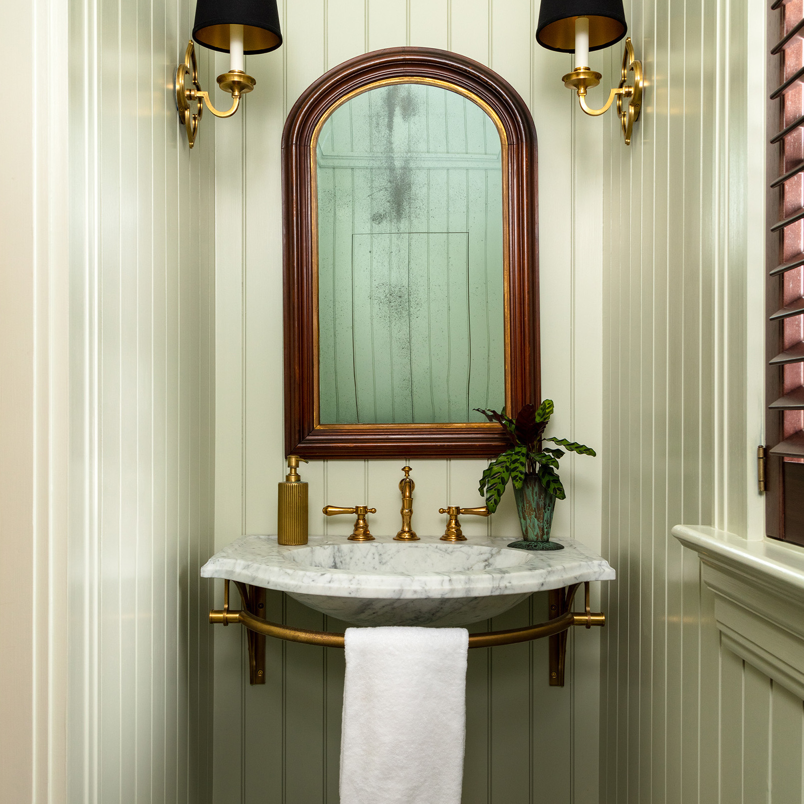 Regency style wall-mounted Vanity in aged brass