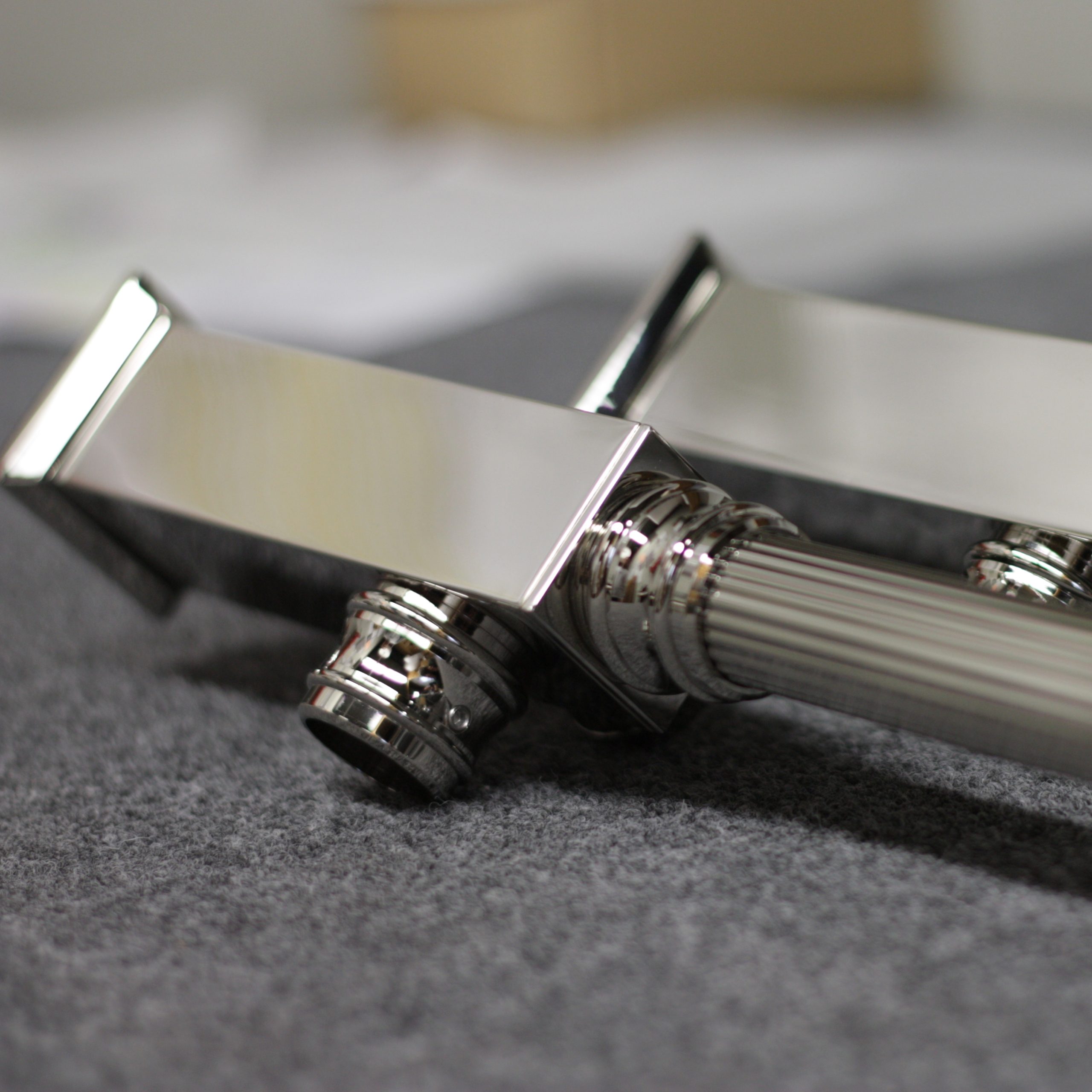 Detail of a custom Capital style Vanity Sink Leg with a single Crossbar and Reeded Tubing