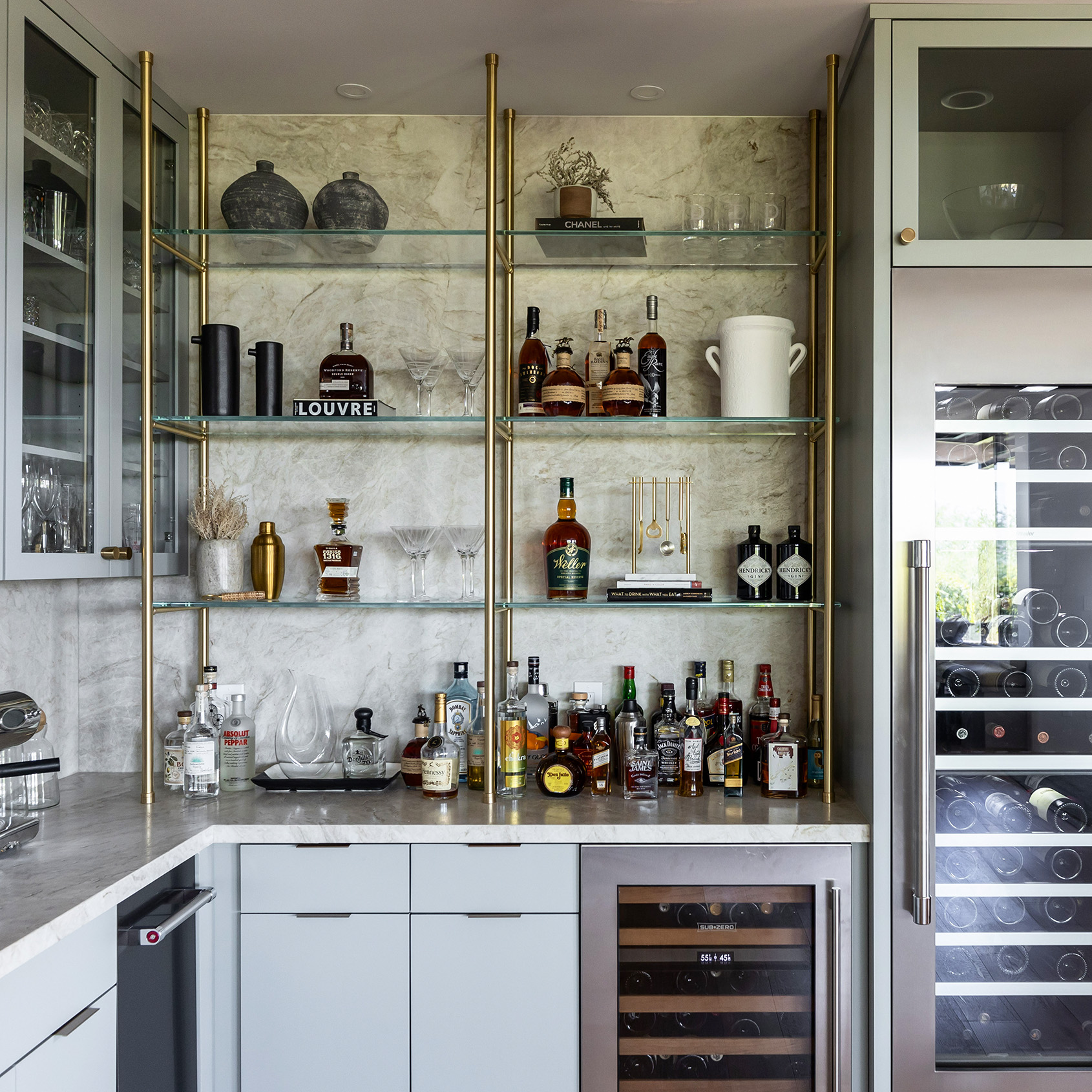 Ceiling & Counter mounted Metro Style Designer Shelving in Polished Brass with glass shelves
