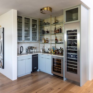 Ceiling & Counter mounted Metro Style Designer Shelving in Polished Brass with glass shelves