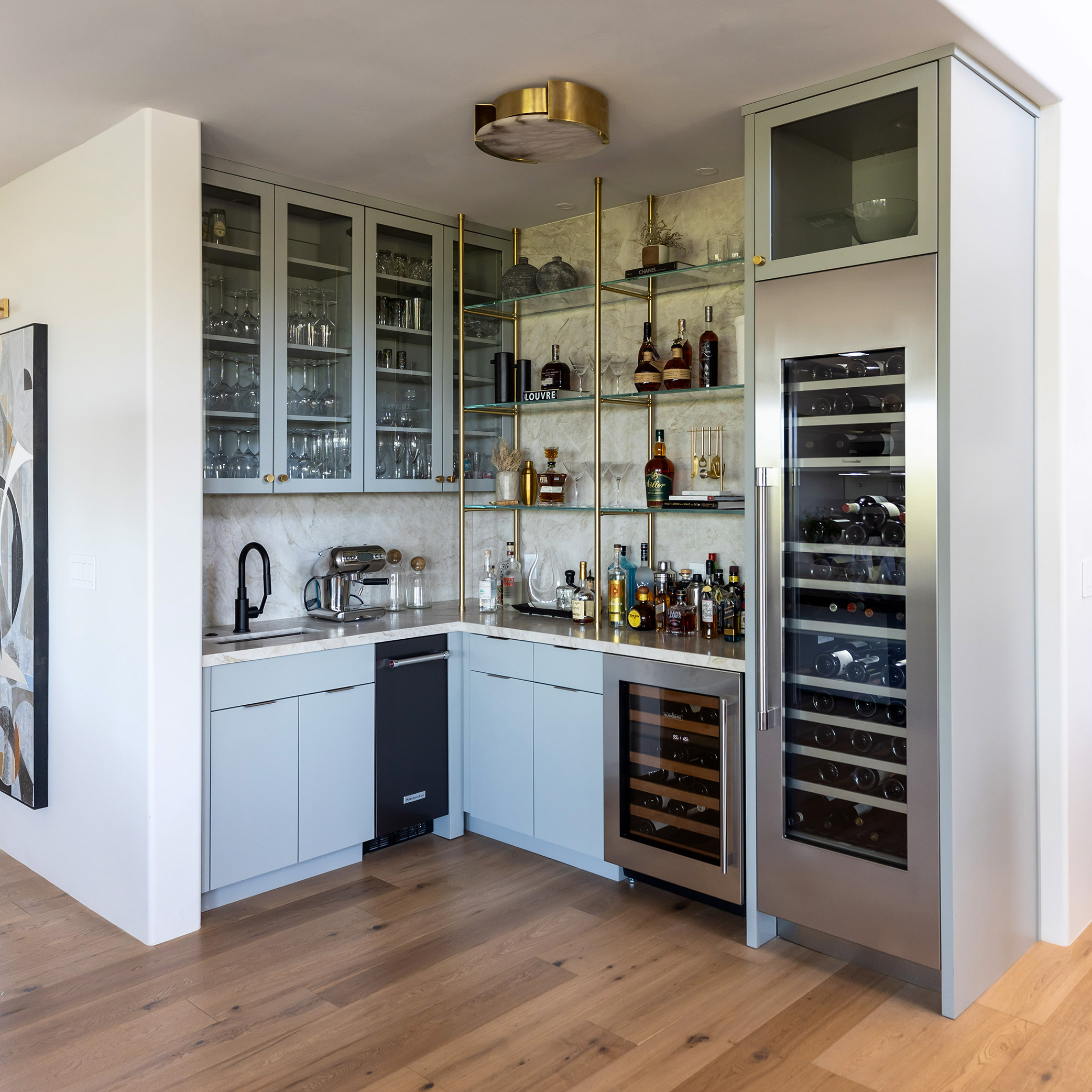 Ceiling & Counter mounted Metro Style Designer Shelving in Polished Brass with glass shelves