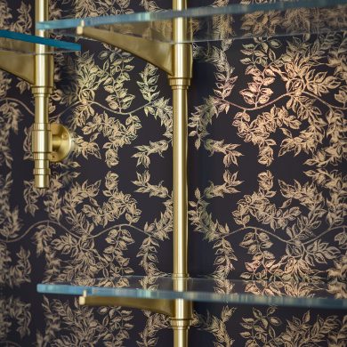 Rack style Cantilever Shelving featuring Studio style wall mounts, solid style Rack Arms, and Button style Finials with rings.