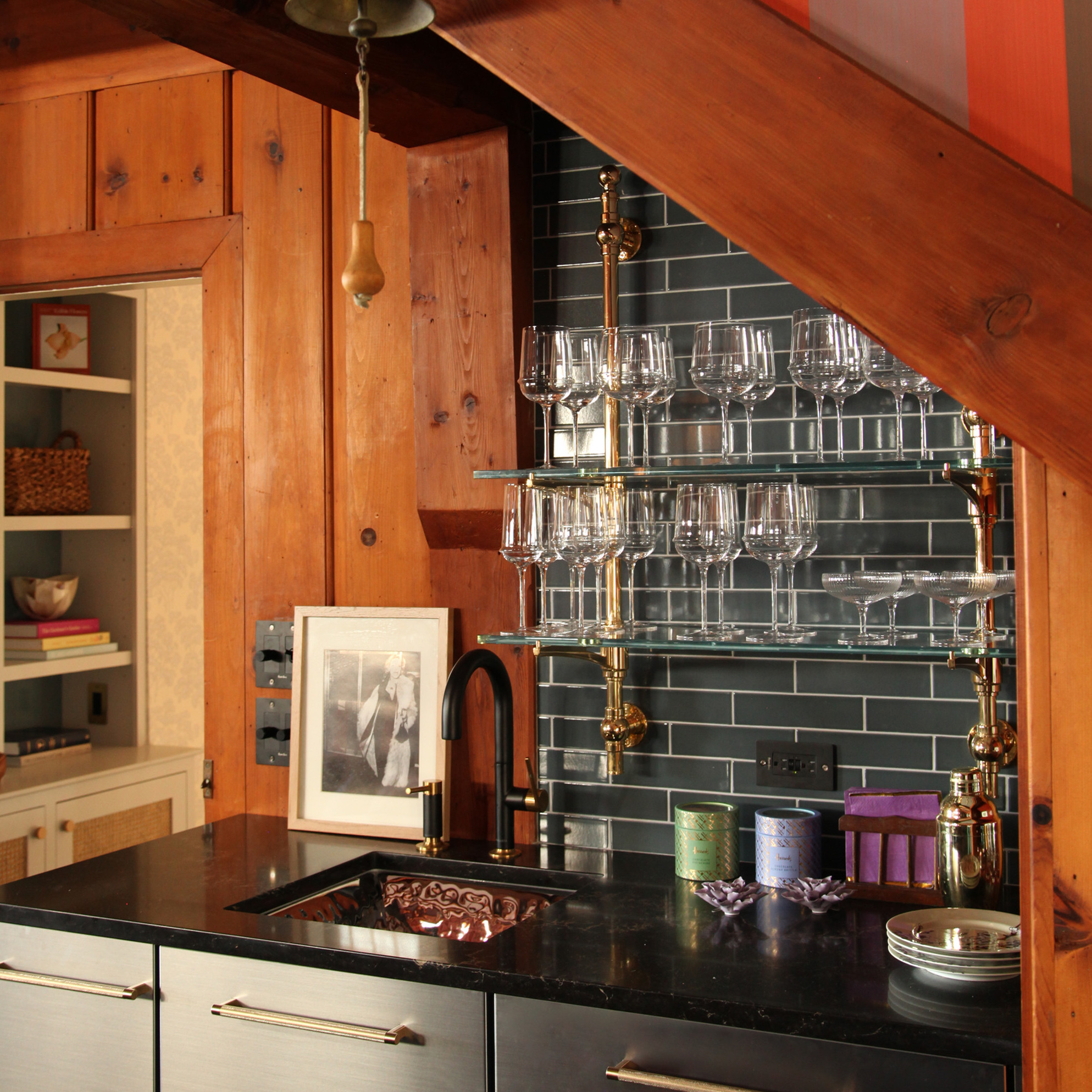 Wall-mounted Rack style Cantilever Shelving feturing Ball style wall mounts, a Bistro style top Finial and a Button style bottom finial