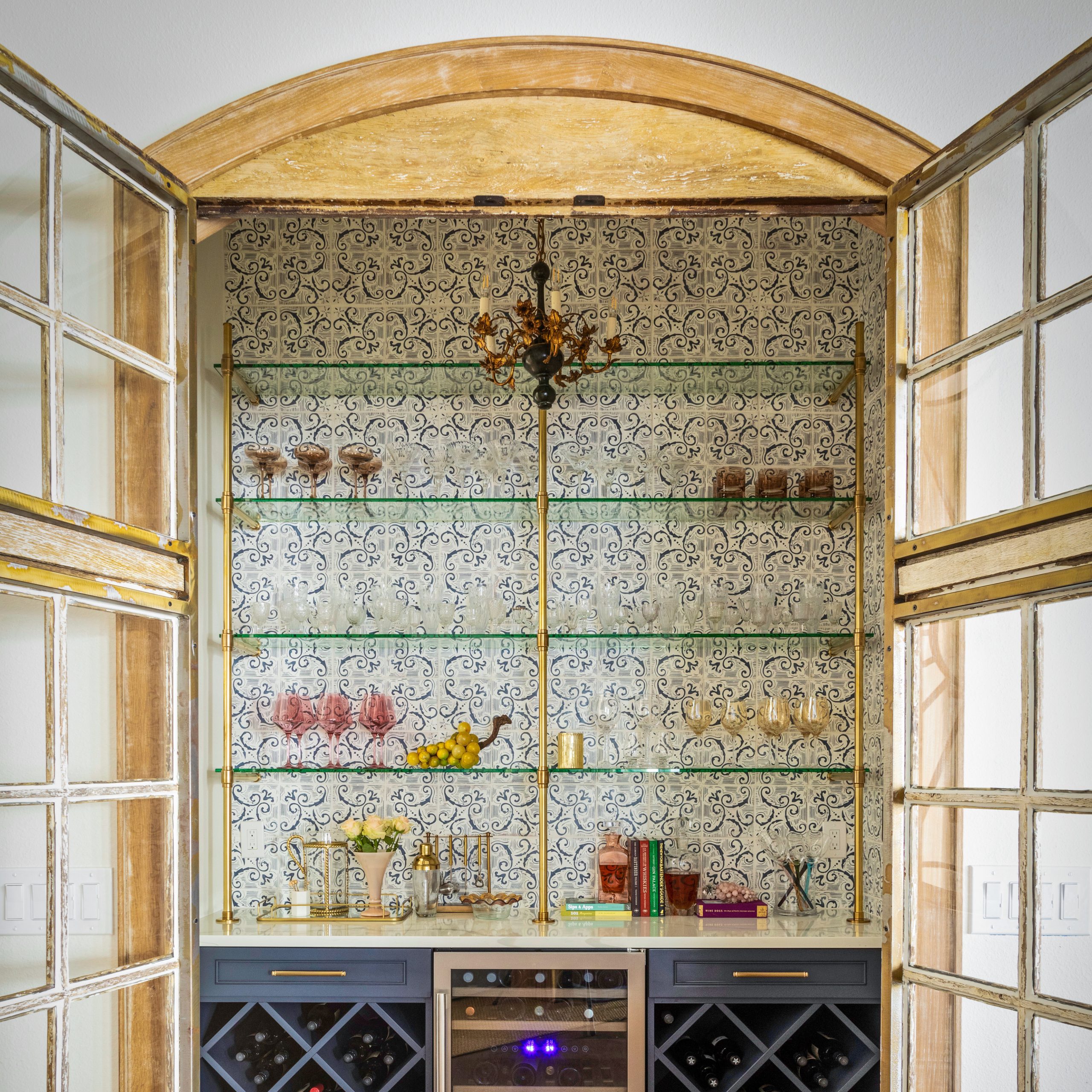 Counter & wall mounted studio style Bistro Designer Shelving in polished brass with Button Finials and glass shelves