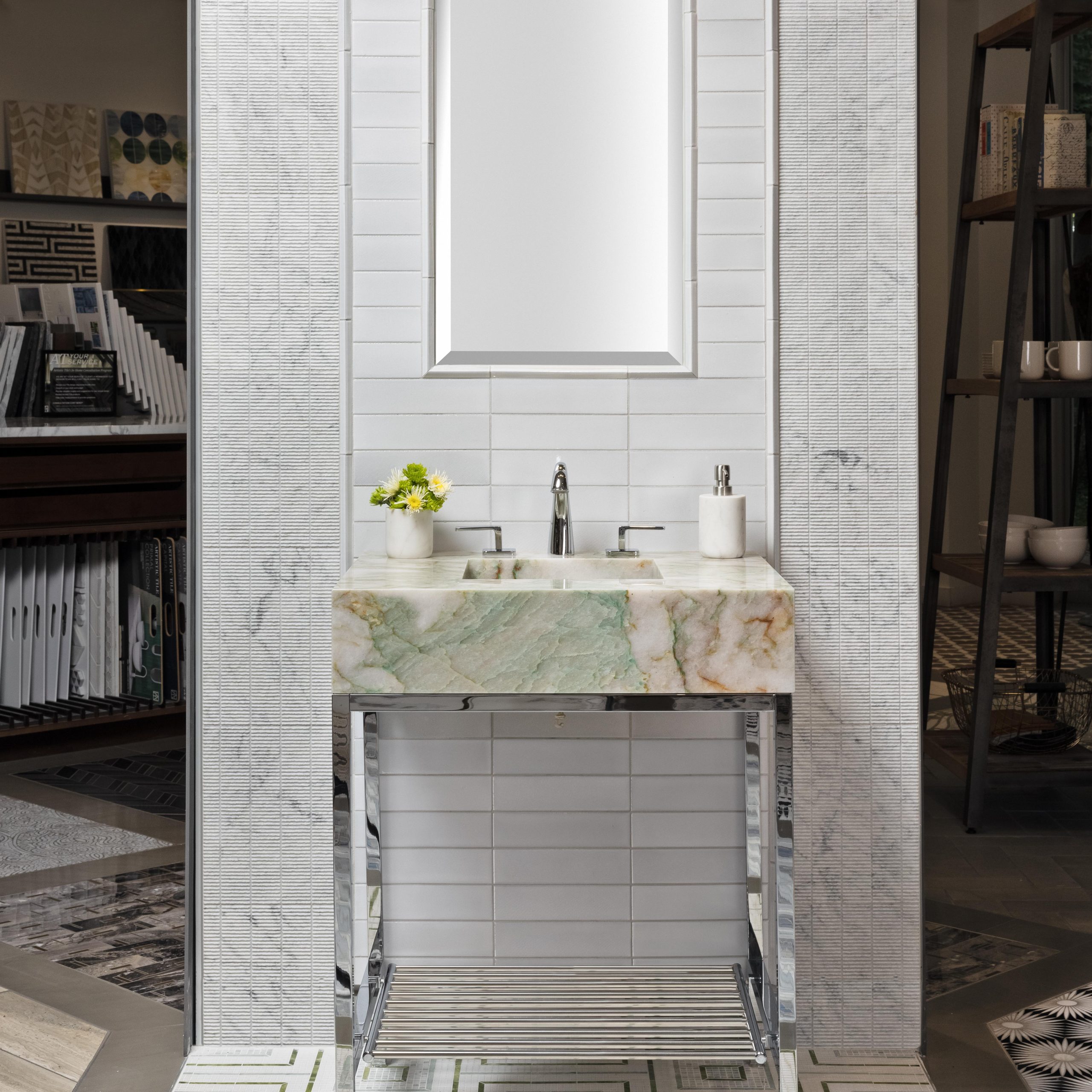 Linear style Vanity Leg System in polished nickel with a Tubular Metal shelf and a solid quartz sinktop