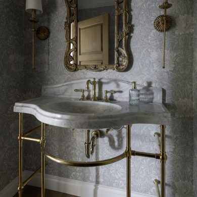 Renaissance style washstand in aged brass with Stone Forest sinktop