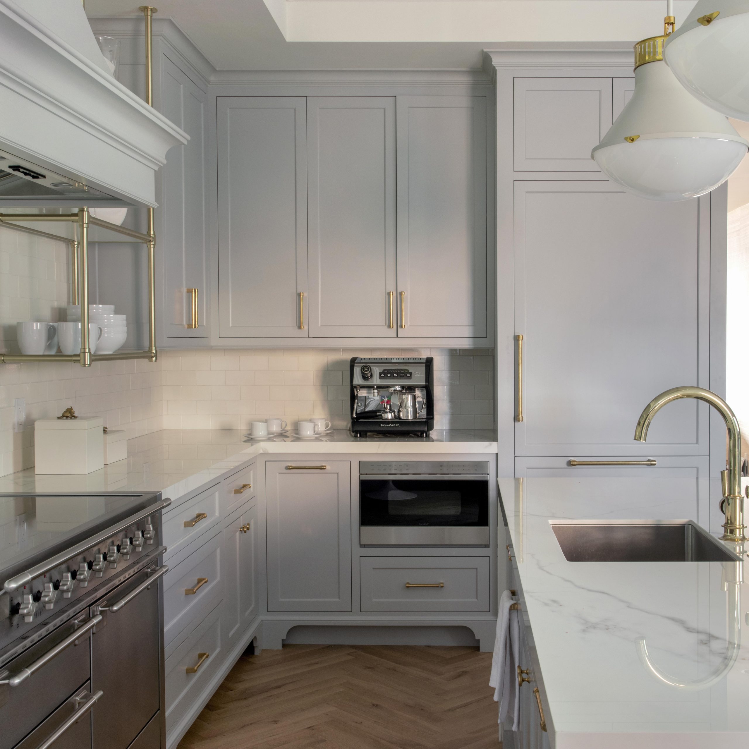 Ceiling-mounted Studio style Bistro Designer Shelving in polished brass with nested glass shelving