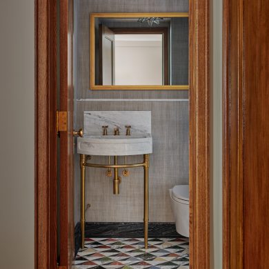 Jamestown style Vanity Sink Legs in Satin Brass with a Stone Forest Harbor style sinktop
