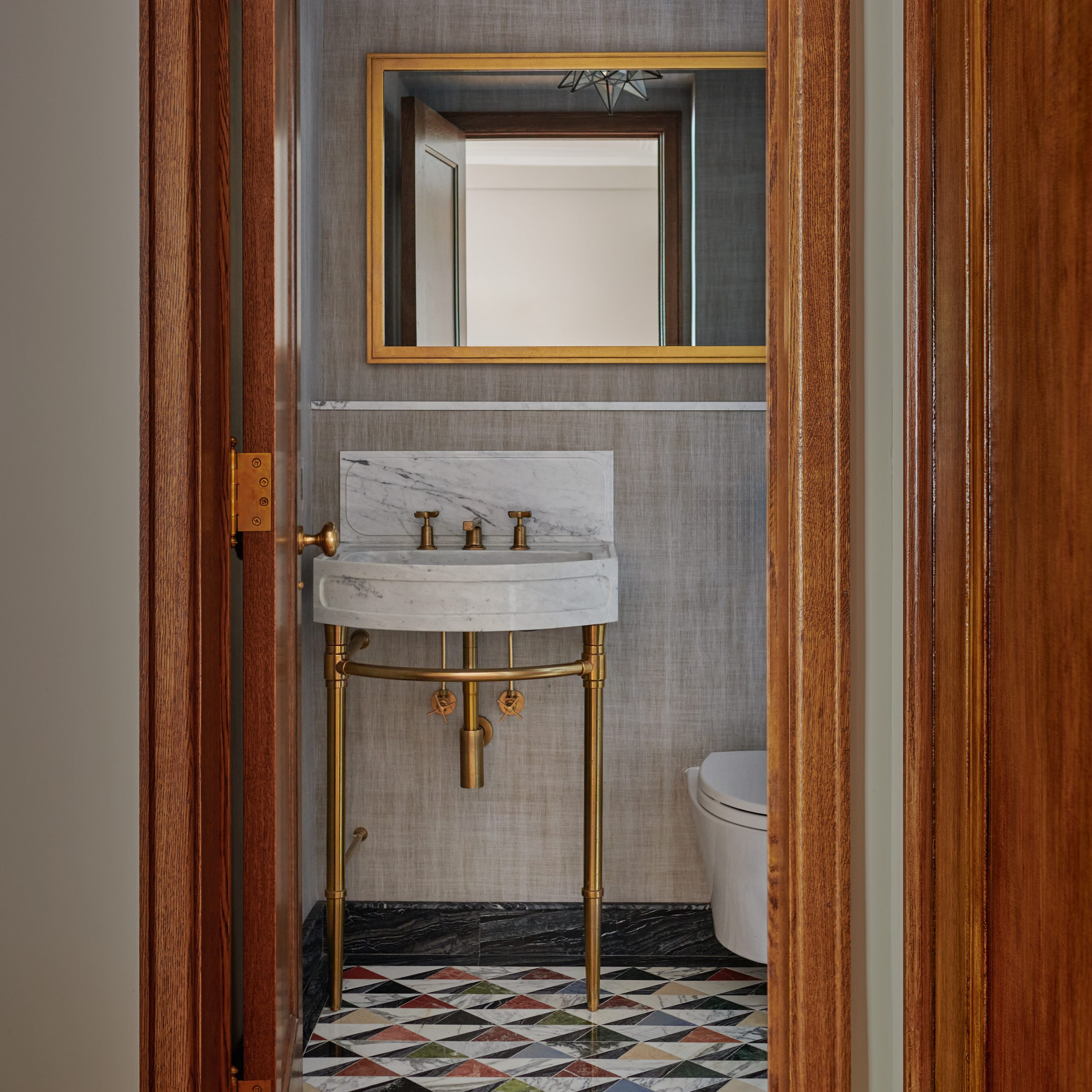 Jamestown style Vanity Sink Legs in Satin Brass with a Stone Forest Harbor style sinktop