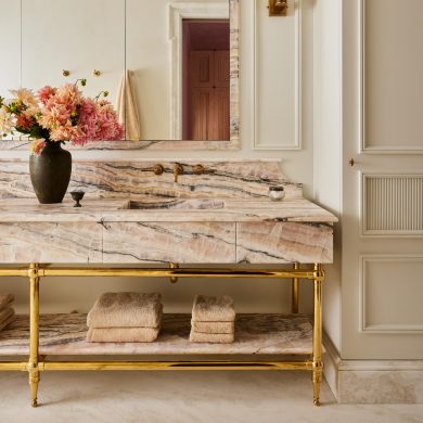 Custom Tapered Foot style Vanity Leg System in polished brass with a marble shelf