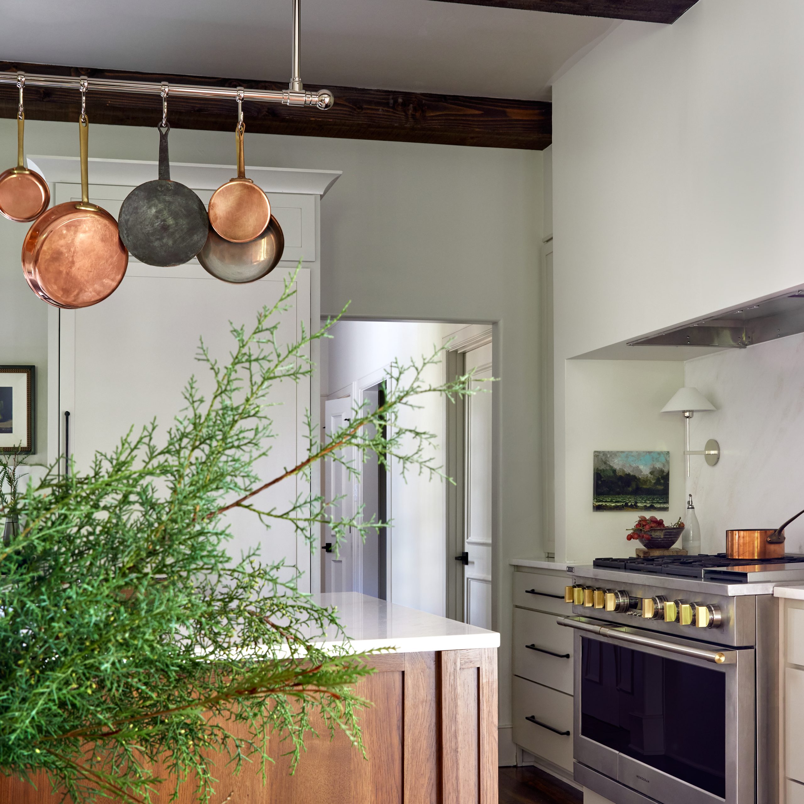 Ceiling-mounted Single Rail style Pot Rack in polished chrome with bistro style Finials
