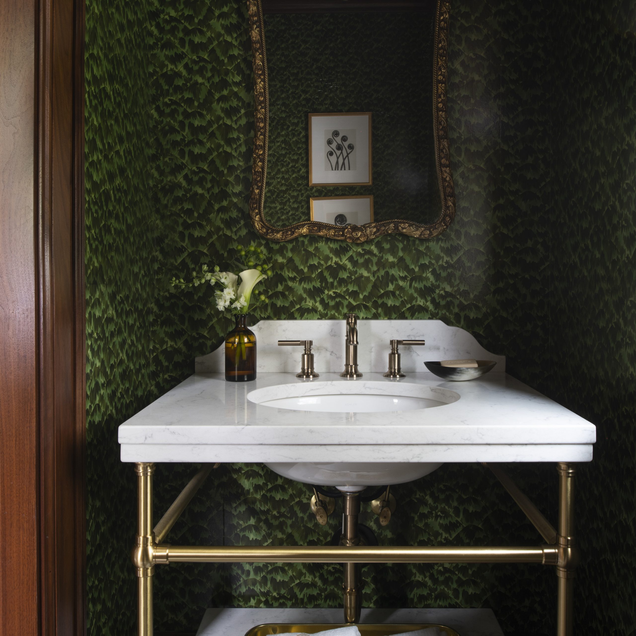 Ball Foot style Vanity Leg System in polished brass with marble top