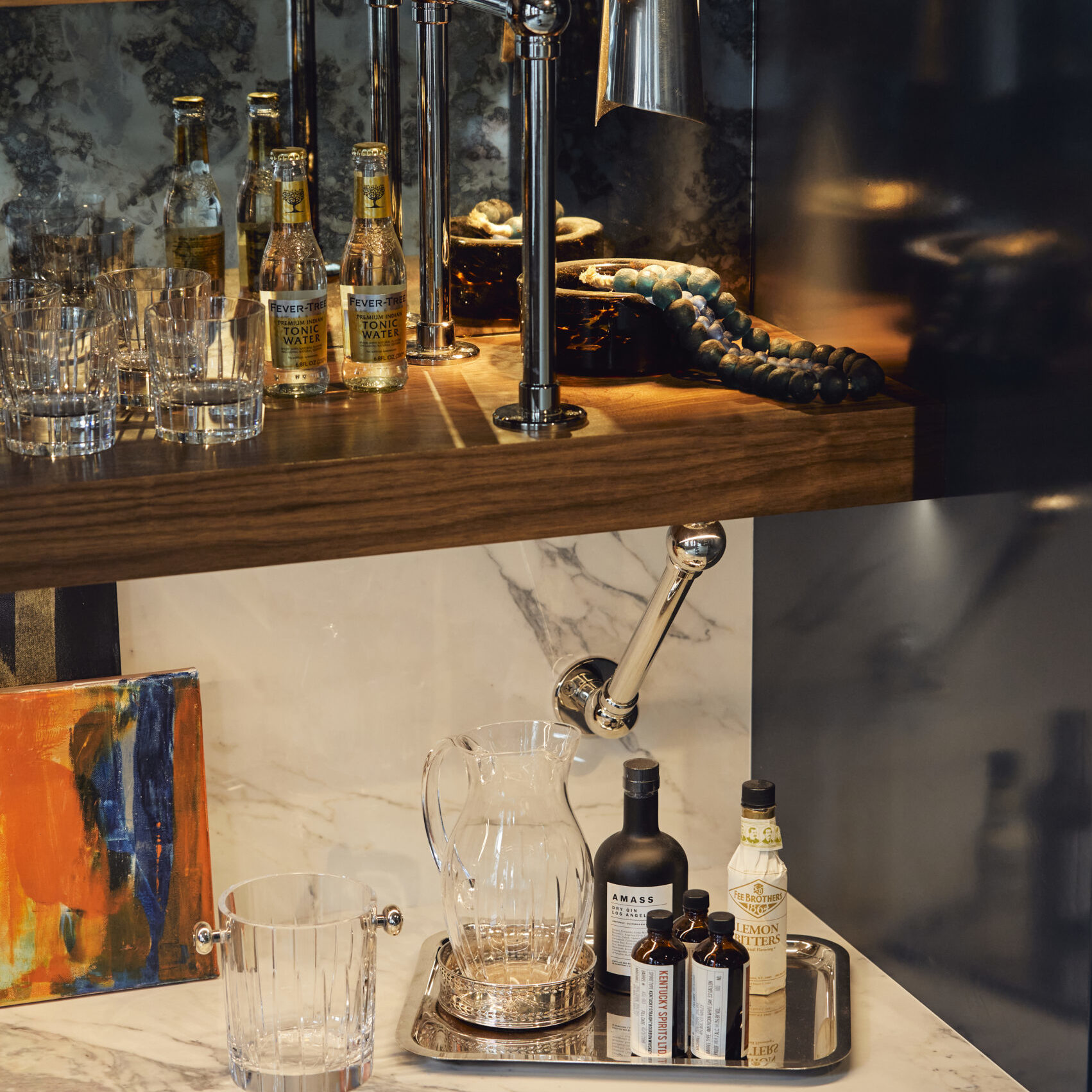 gnature Designer Bracket Shelving supporting a wood shelf with a Counter-mounted Ball style Bistro shelving above