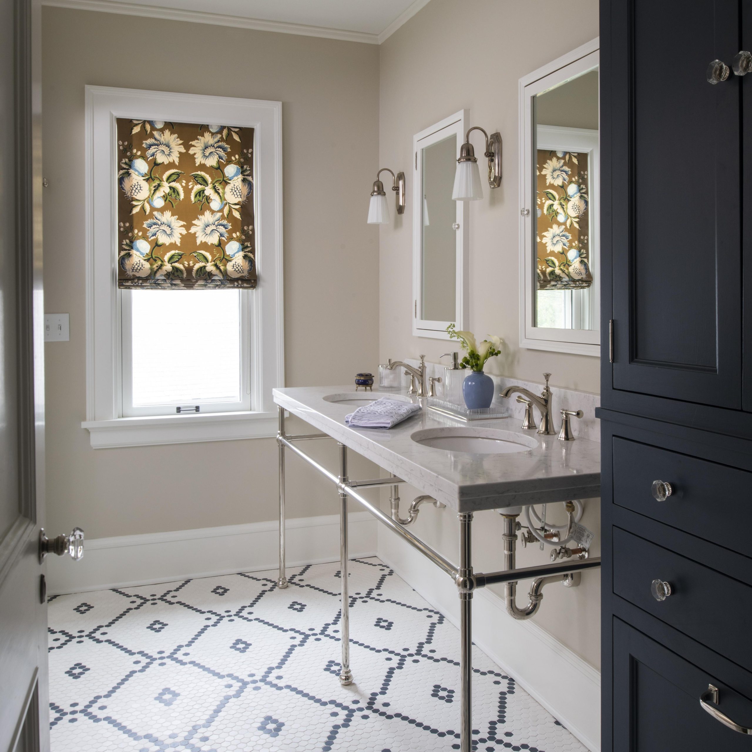 Ball Foot style Vanity Leg System in polished chrome with marble top