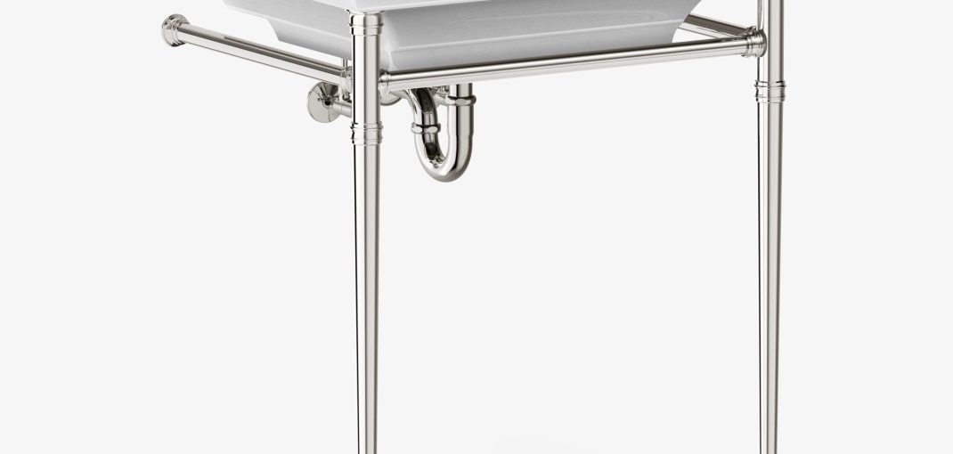 An Exxex style Vanity Sink Leg System in polished chrome with a china sinktop