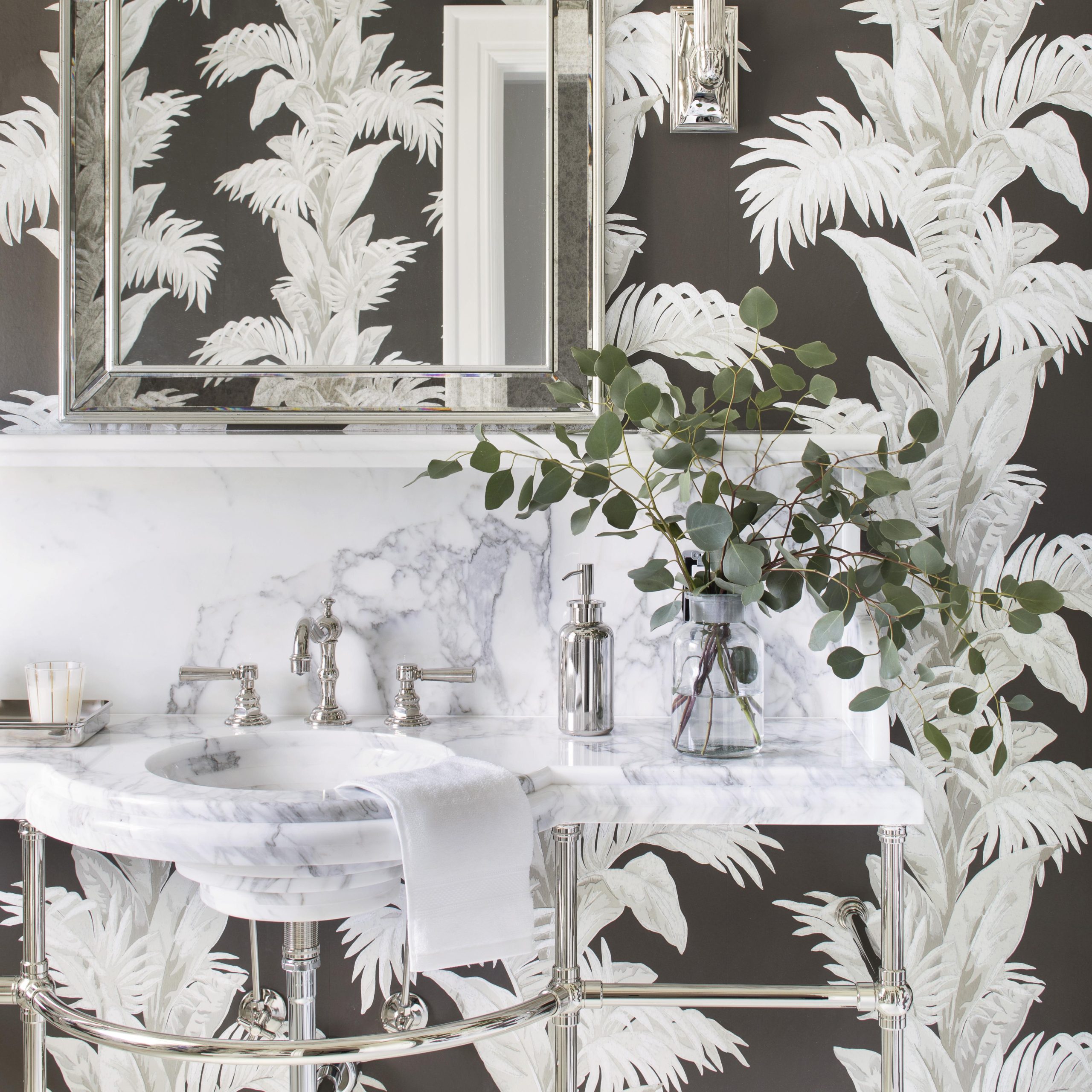 Renaissance style Vanity Leg System in polished chrome with marble top and awesome wallpaper