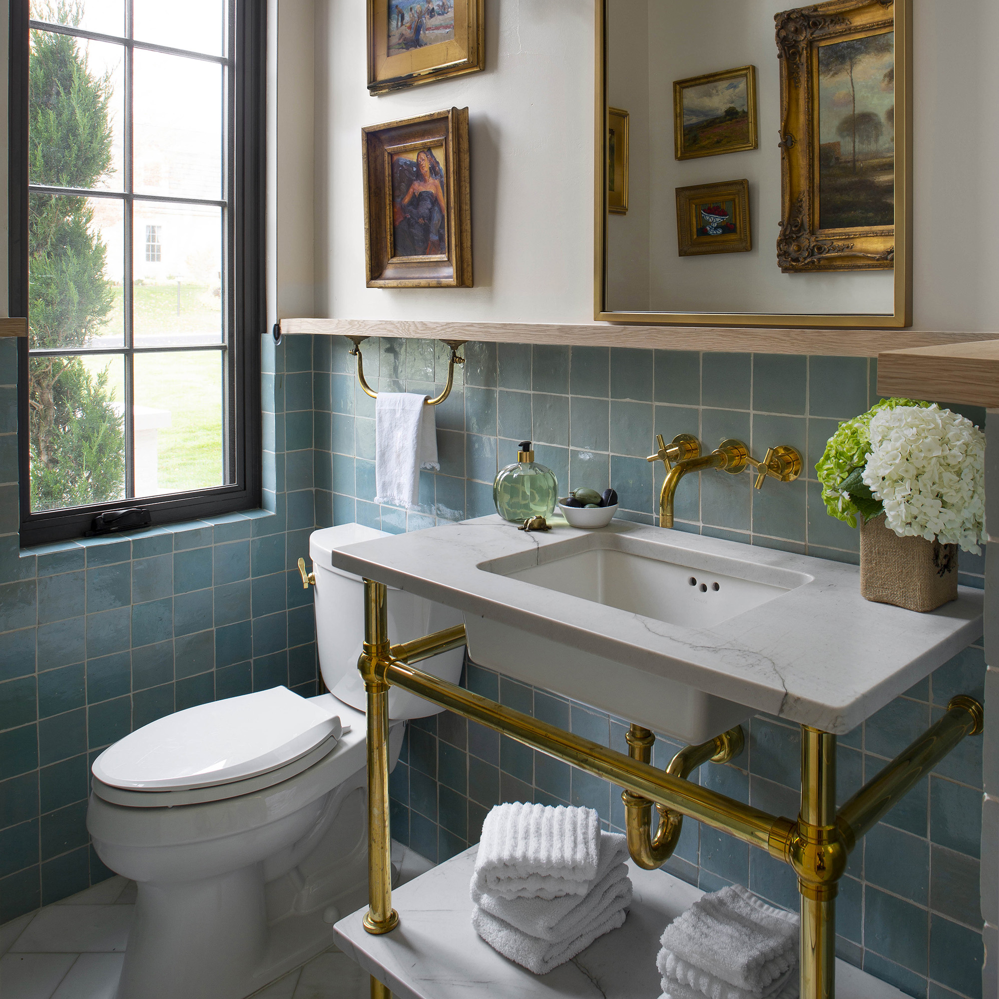 Ball Foot style Vanity Leg System in aged brass with Split Collar supported marble shelf