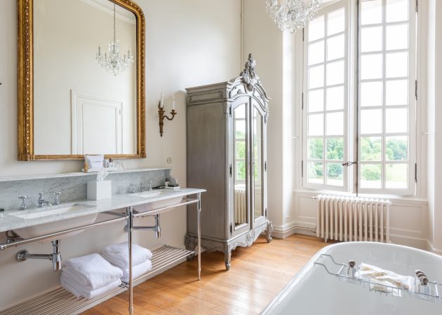 Westport Vanity Leg System with tubular metal Hotel style shelving in the Hotel Chateau