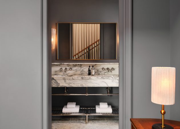 Ball Foot style Vanity Leg System with Hotel Style Tumular shelving in polished chrome